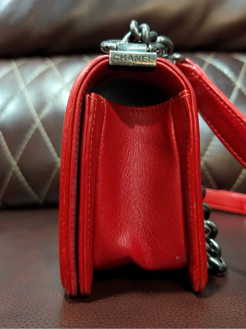 CHANEL Red leather small Boy with gunmetal tone chain